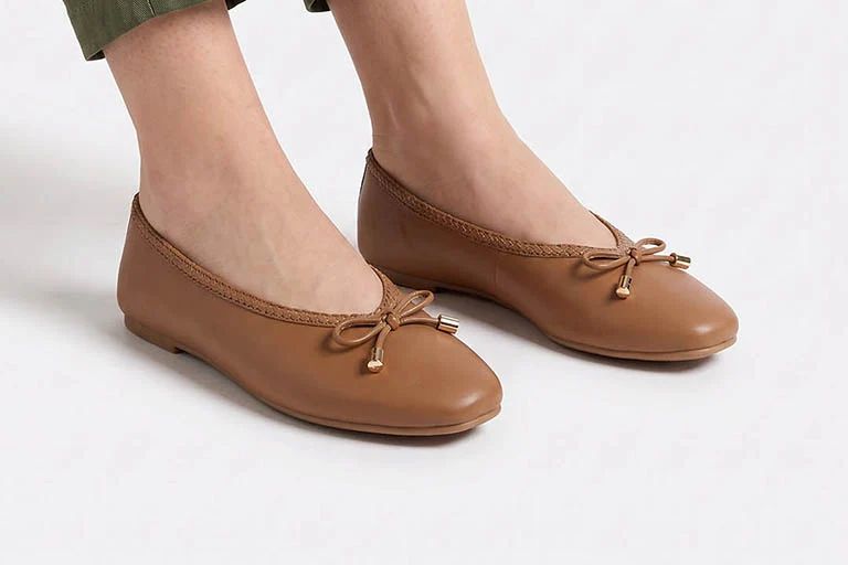 Ballet flats worn with the liner — nothing shows at the shoe line