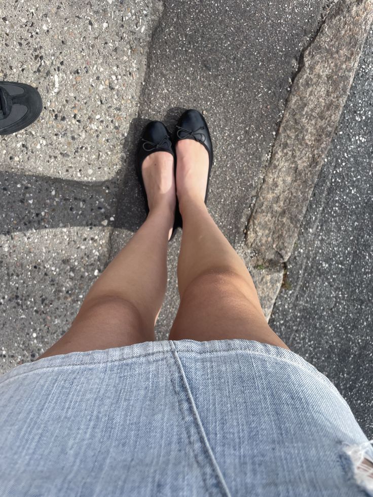 Worn in black ballet flats