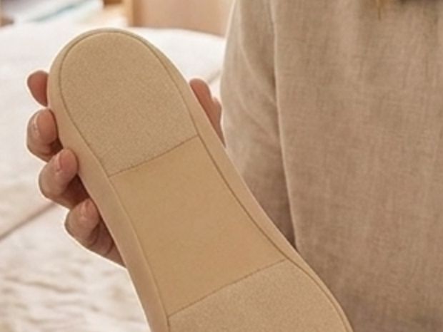 Close-up of the sponge sole in hand